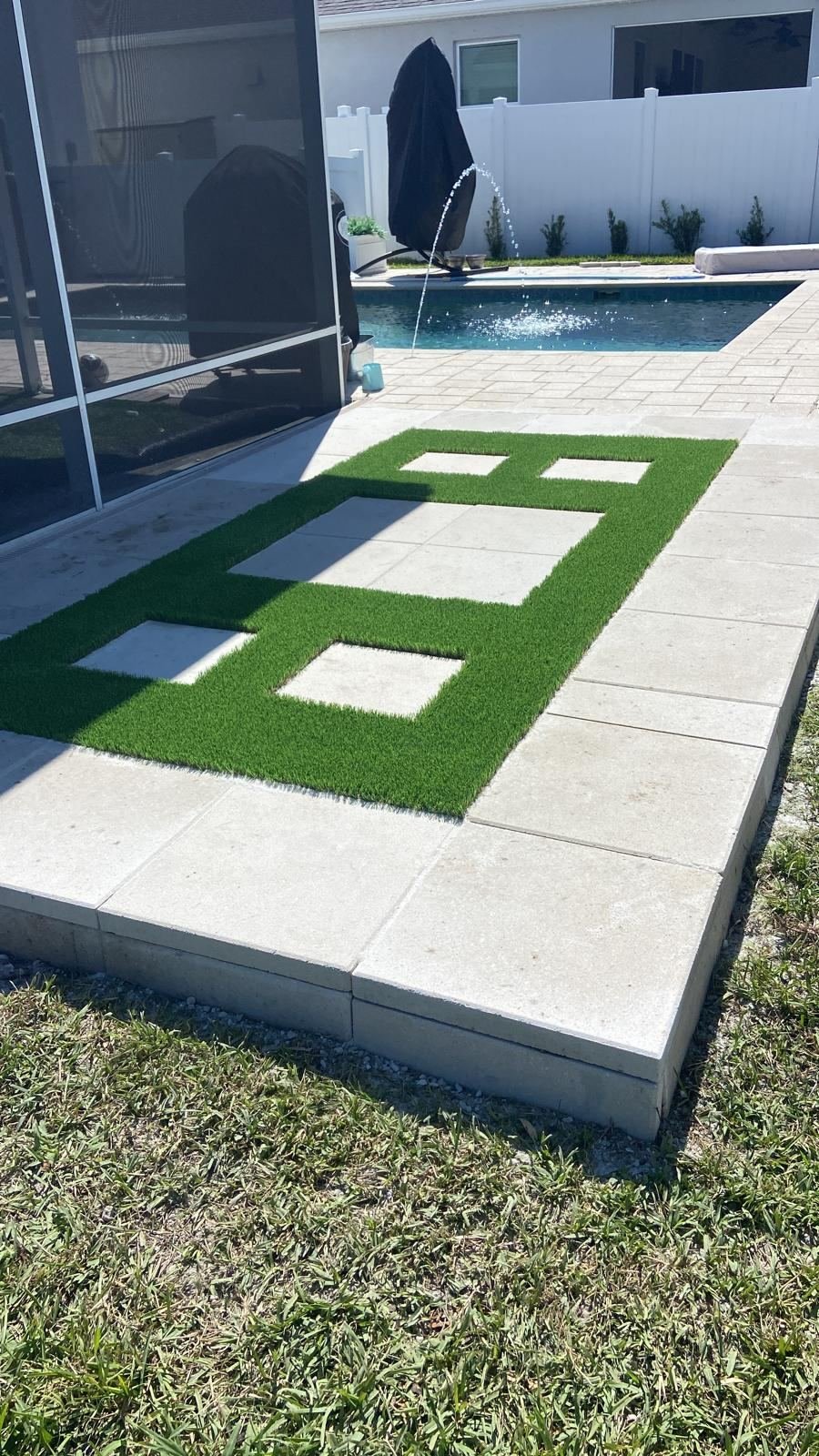 Turf installation after around pool pavers